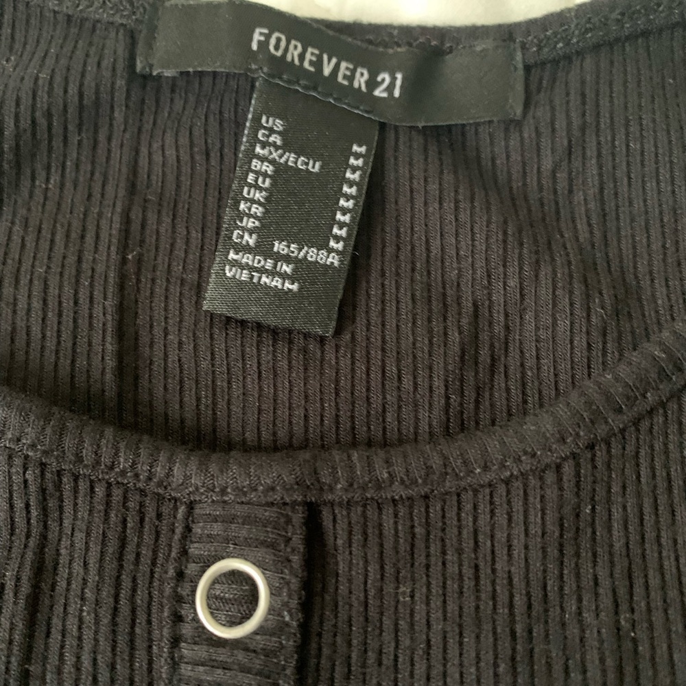 #25 Black ribbed dress with spaghetti straps and stud detail down the front.  Si - Picture 3 of 3